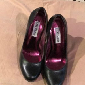 Black leather heels.